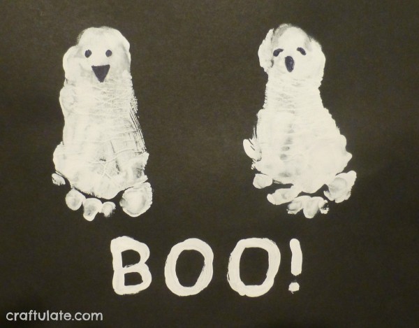 Halloween feet ghosts in white paint Halloween feet ghosts in white